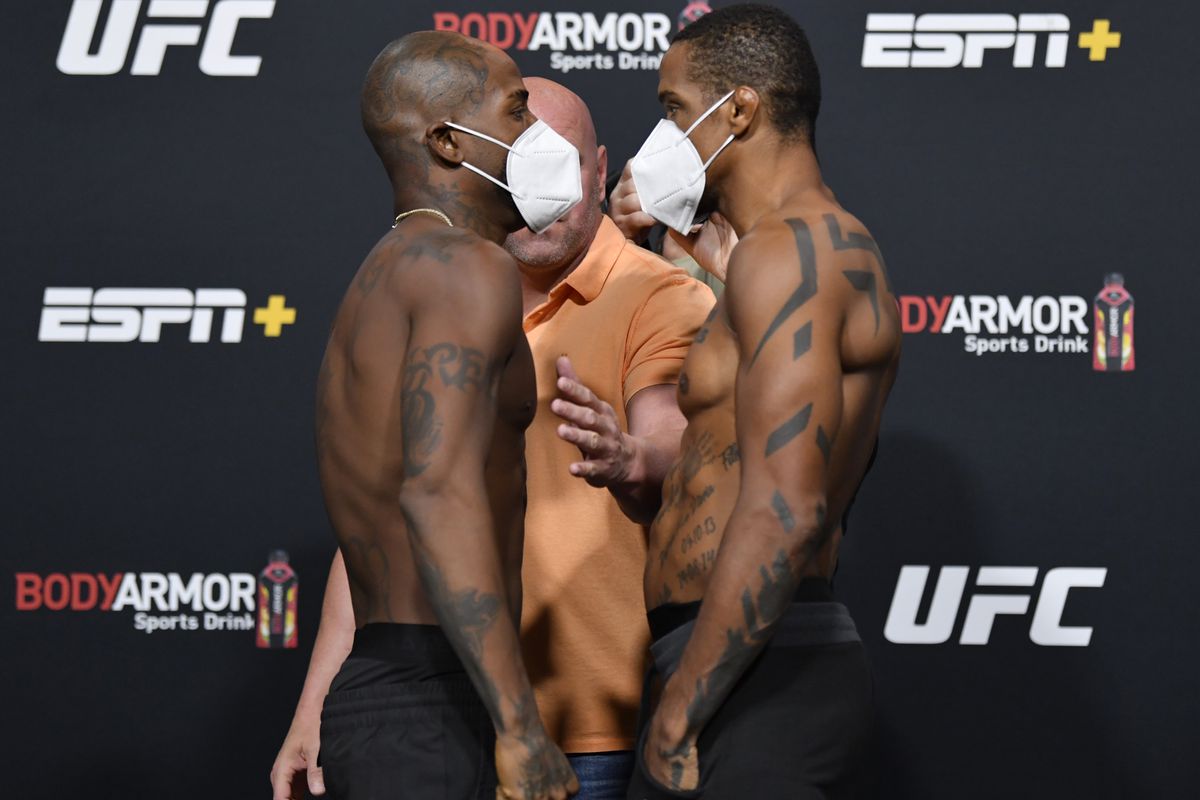Opponents Bobby Green and Alan Patrick of Brazil face off during the UFC Fight Night weigh-in at UFC APEX on September 11, 2020 in Las Vegas, Nevada.