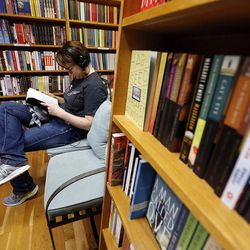 Ailem Hassen reads a book at The King's English Bookshop in Salt Lake City on Wednesday, Aug. 23, 2017.