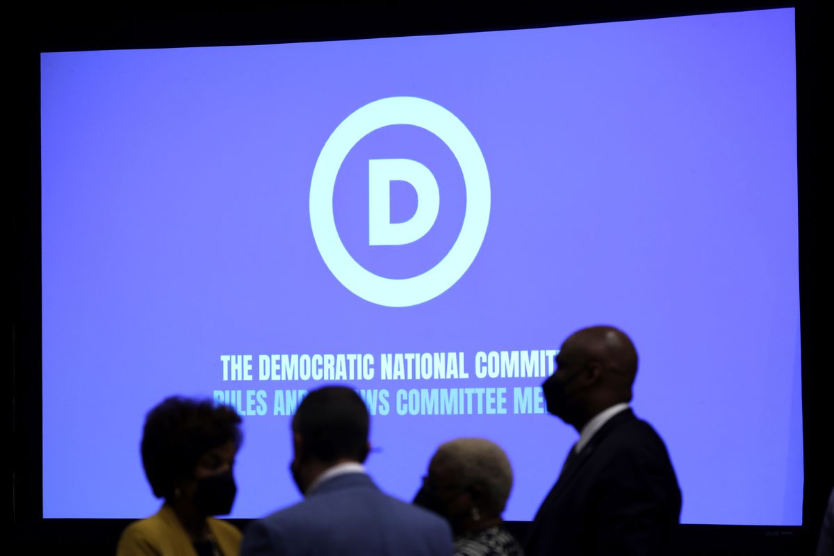 Committee members wait for the beginning of a meeting of the Democratic National Committee’s Rules and Bylaw Committee on April 13, 2022 in Washington, DC. 