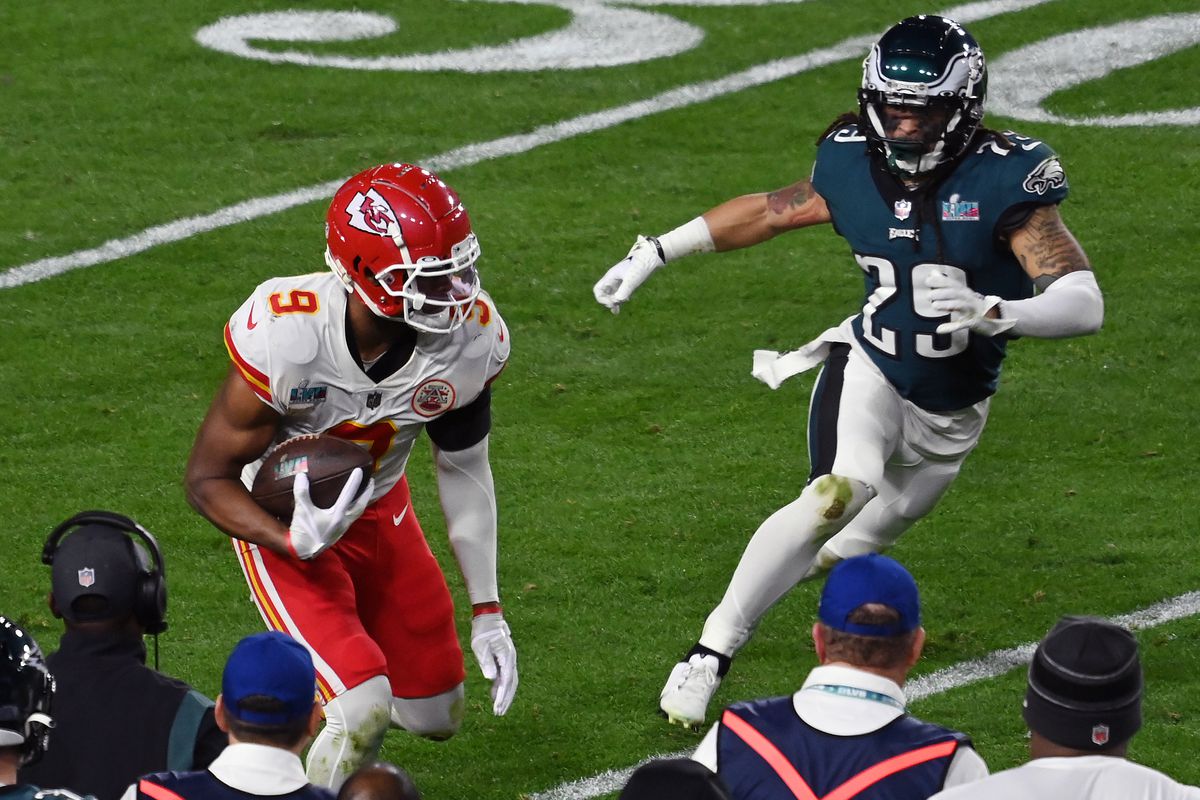 JuJu Smith-Schuster of the Kansas City Chiefs runs with the ball after catching a pass against the Philadelphia Eagles during the second half in Super Bowl LVII at State Farm Stadium on February 12, 2023 in Glendale, Arizona.