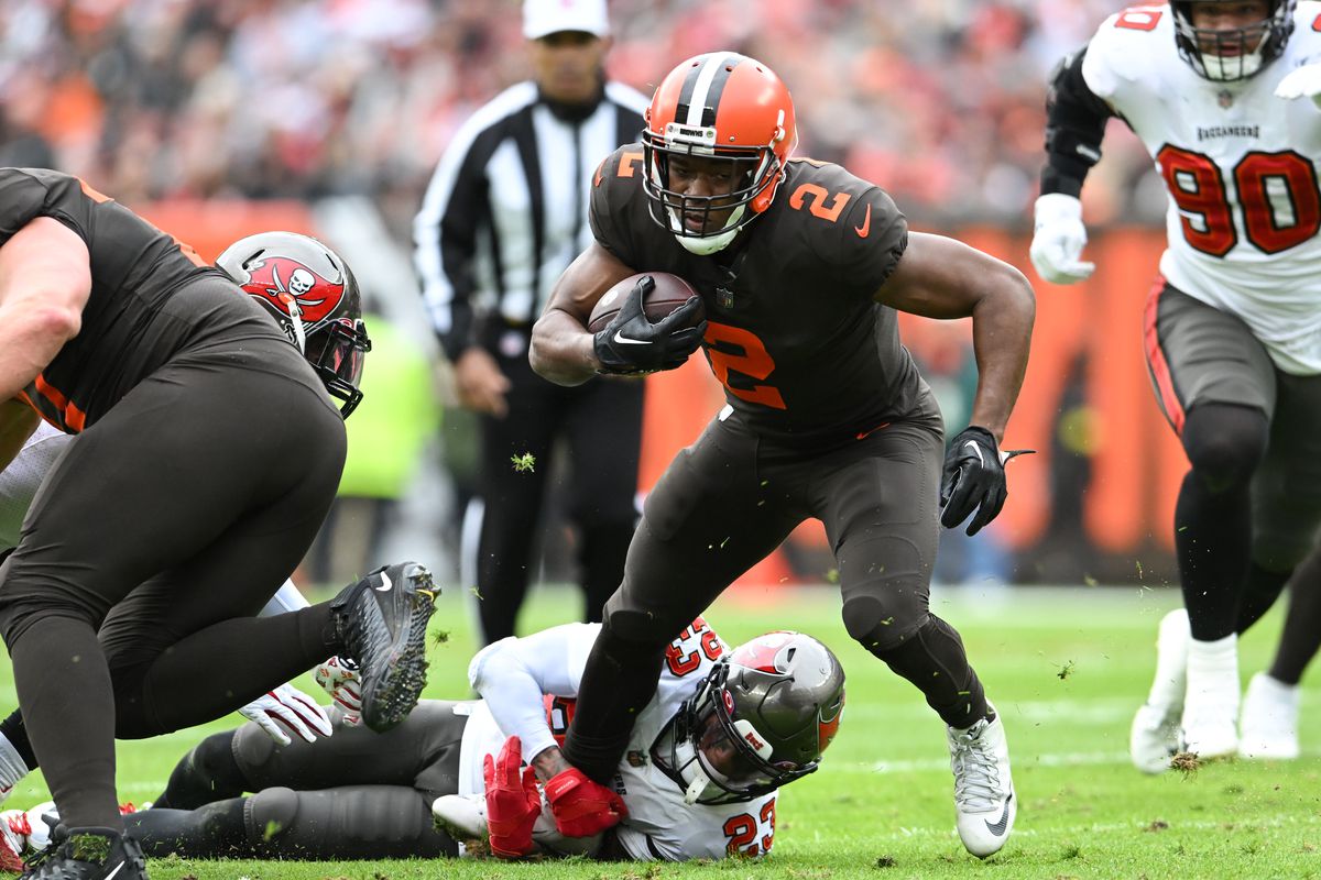 Amari Cooper #2 of the Cleveland Browns breaks the tackle of Sean Murphy-Bunting #23 of the Tampa Bay Buccaneers during the first half at FirstEnergy Stadium on November 27, 2022 in Cleveland, Ohio.