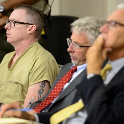 Craig Crawford, left, listens as 3rd District Judge James Blanch sentences him to life in prison without the possibility of parole at the Matheson Courthouse in Salt Lake City on Thursday, Aug. 31, 2017. Crawford admitted that he trapped his 72-year-old estranged husband, well-known restaurateur John Williams, inside his home and then set it ablaze last year.