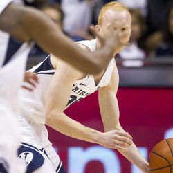 Brigham Young guard TJ Haws (30) looks to pass to a teammate during an NCAA college basketball game against Coppin State in Provo on Thursday, Nov. 17, 2016.