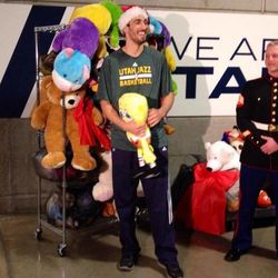Jazz center Enes Kanter smiled and admitted this SpongeBob Squarepants toy was the favorite one he's donating to needy Utah children.