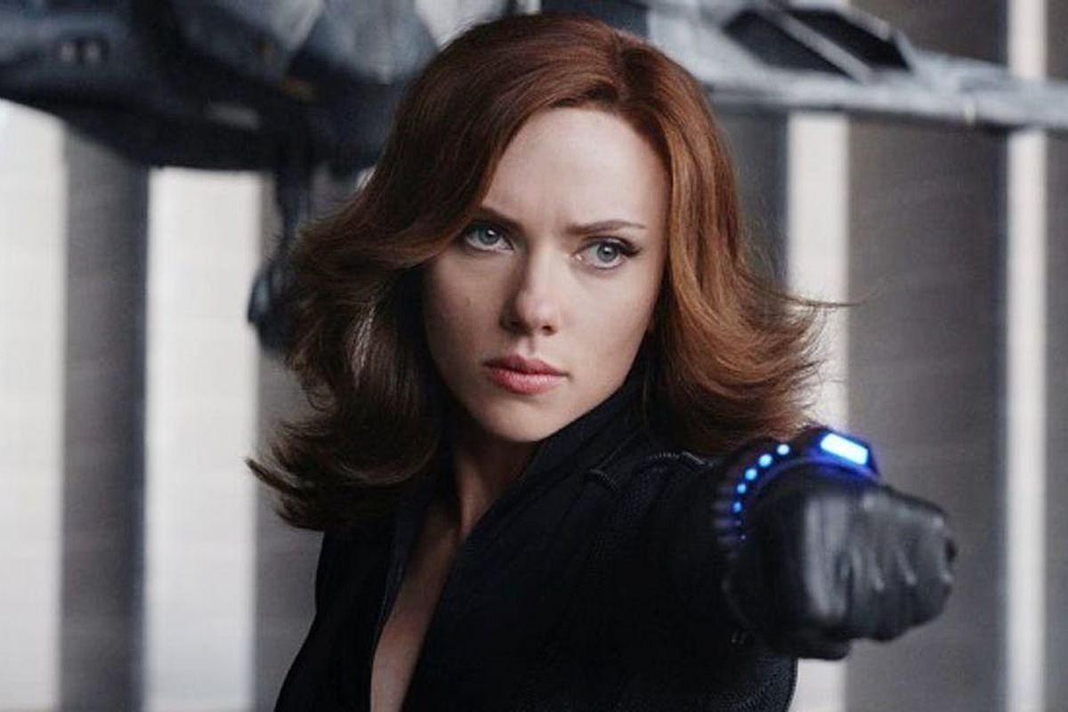 Scarlett Johansson readies her Widow’s Bite wrist launcher, as Natasha Romanoff/Black Widow in Captain America: Civil War.