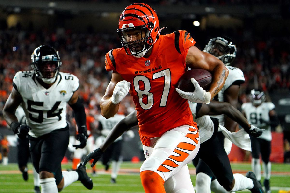 Cincinnati Bengals tight end C.J. Uzomah (87) catches a pass on a touchdown in the fourth quarter during a Week 4 NFL football game against the Jacksonville Jaguars, Thursday, Sept. 30, 2021, at Paul Brown Stadium in Cincinnati.