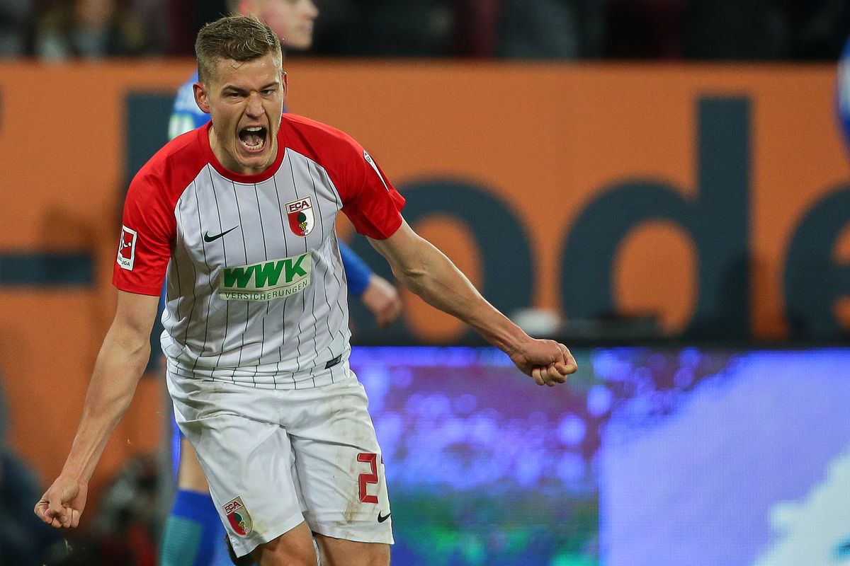 AUGSBURG, GERMANY - NOVEMBER 25: Alfred Finnbogason of Augsburg celebrates after scoring his team`s second goal during the Bundesliga match between FC Augsburg and VfL Wolfsburg at WWK-Arena on November 25, 2017 in Augsburg, Germany.