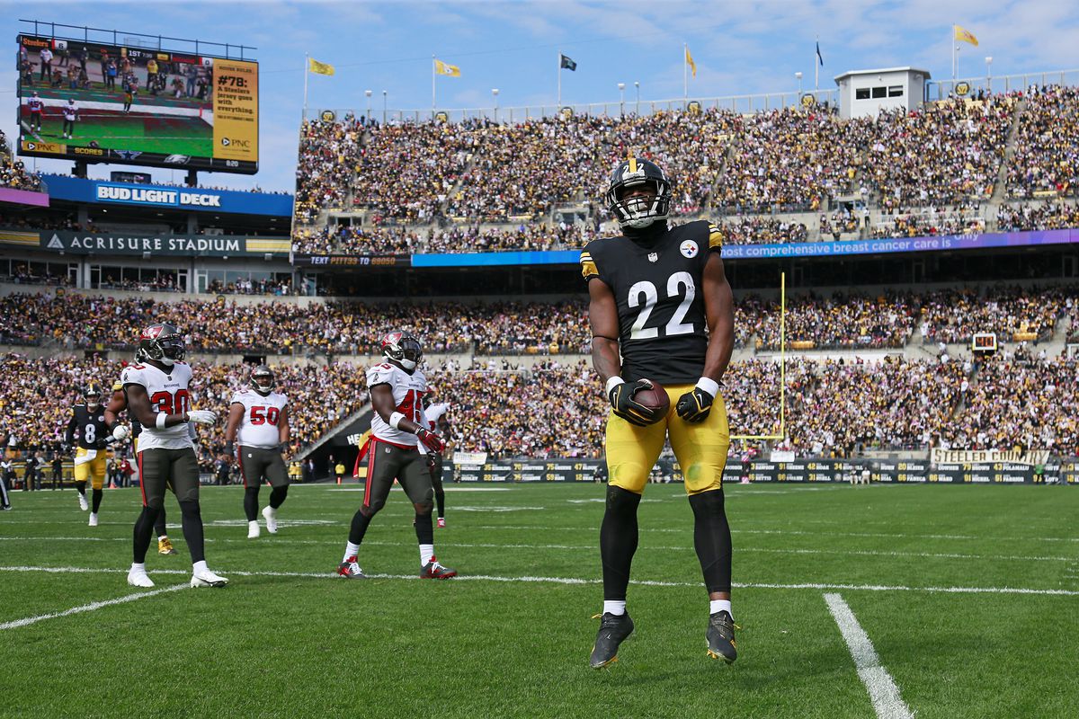 Najee Harris #22 of the Pittsburgh Steelers celebrates after a touchdown during the first quarter against the Tampa Bay Buccaneers at Acrisure Stadium on October 16, 2022 in Pittsburgh, Pennsylvania.