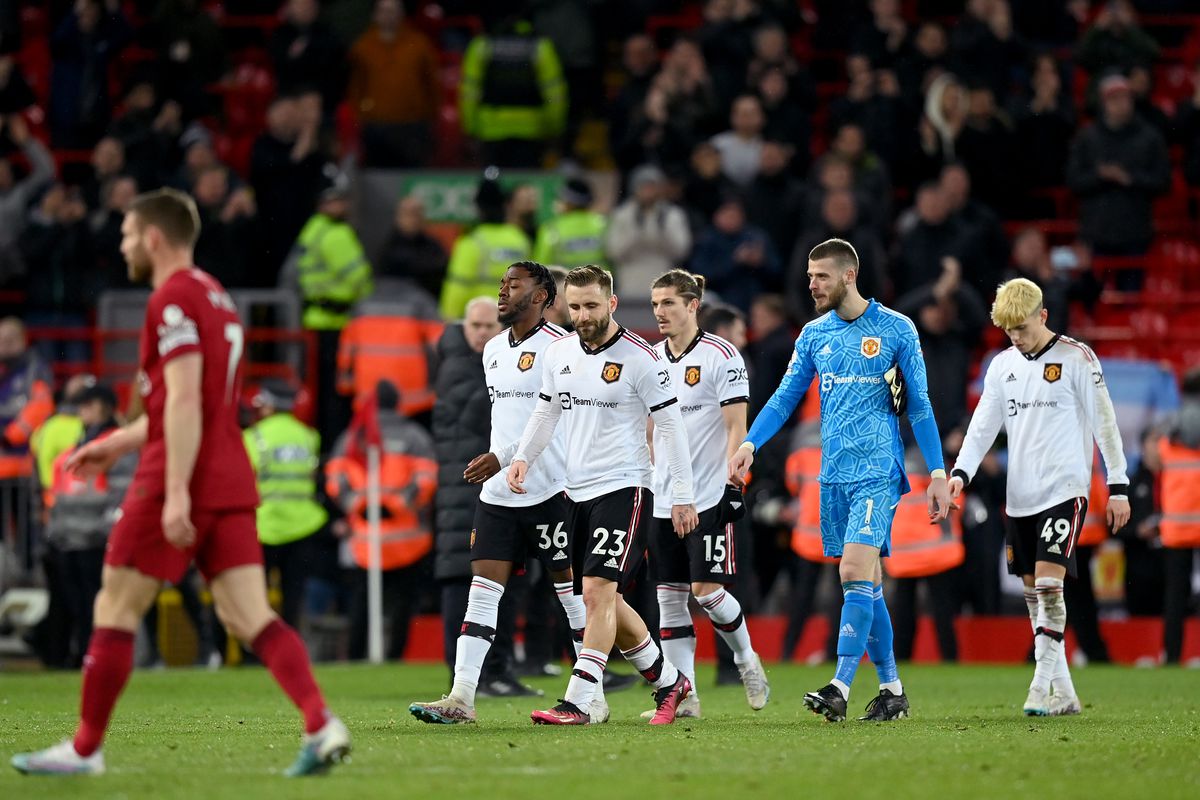 Players of Manchester United look dejected as they leave the field, after being defeated 7-0 during the Premier League match between Liverpool FC and Manchester United at Anfield on March 05, 2023 in Liverpool, England.