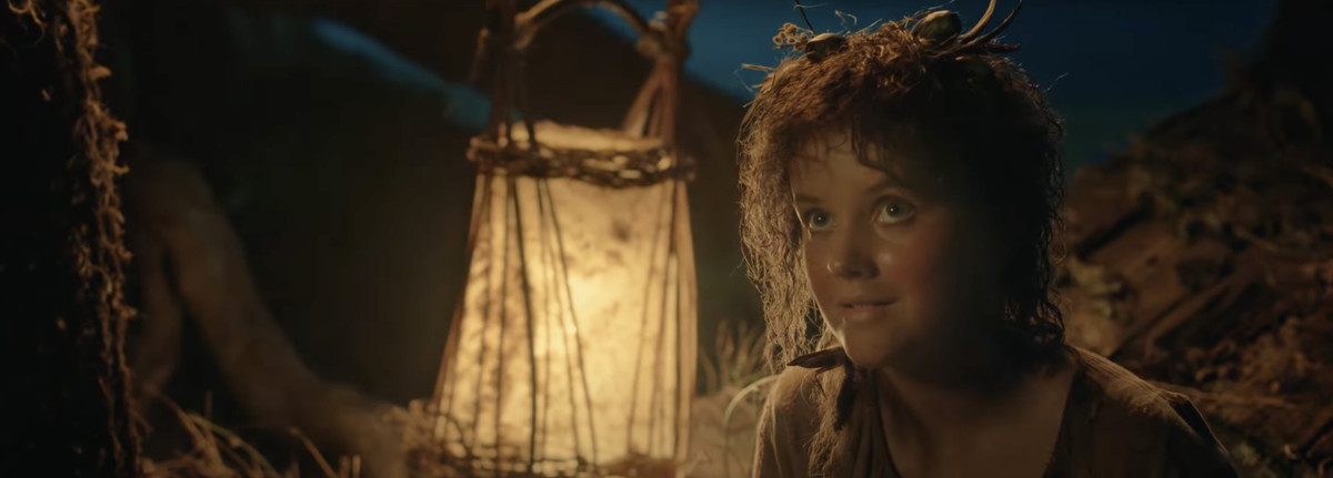 Megan Richards as a young Harfoot/hobbit girl in The Lord of the Rings: The Rings of Power.
