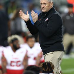 Utah Utes head coach Kyle Whittingham claps is hands as he players stretch as Utah prepares to play Washington in the Pac-12 Championship game at Levi's Stadium in Santa Clara on Friday, Nov. 30, 2018.