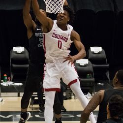 PULLMAN, WA - DECEMBER 13: Washington State center Efe Abogidi (0) goes up for a dunk during the first half of a non-conference matchup between the Portland State Vikings and the Washington State Cougars on December 13, 2020, at Beasley Coliseum in Pullman, WA.