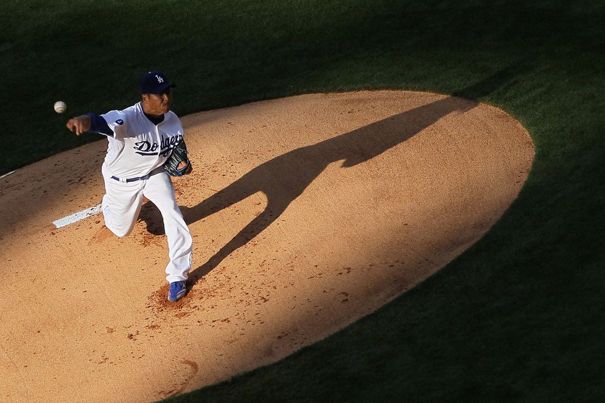 LOS ANGELES, CA - APRIL 03:  Hiroki Kuroda #18 of the Los Angeles Dodgers pitches against the San Francisco Giants in the first inning at Dodger Stadium on April 3, 2011 in Los Angeles, California.