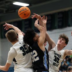 Copper Hills and West Jordan play a high school basketball game at Copper Hills in West Jordan on Friday, Jan. 14, 2022.