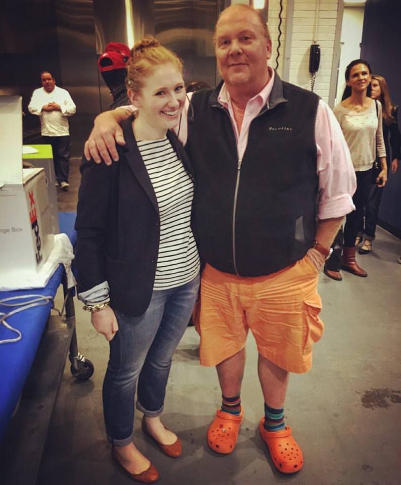A woman with chef Mario Batali.