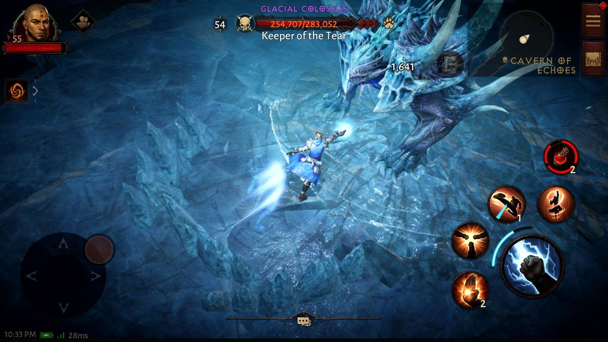A monk battles the Warden of the Tear boss in a frozen dungeon in a screenshot from Diablo Immortal