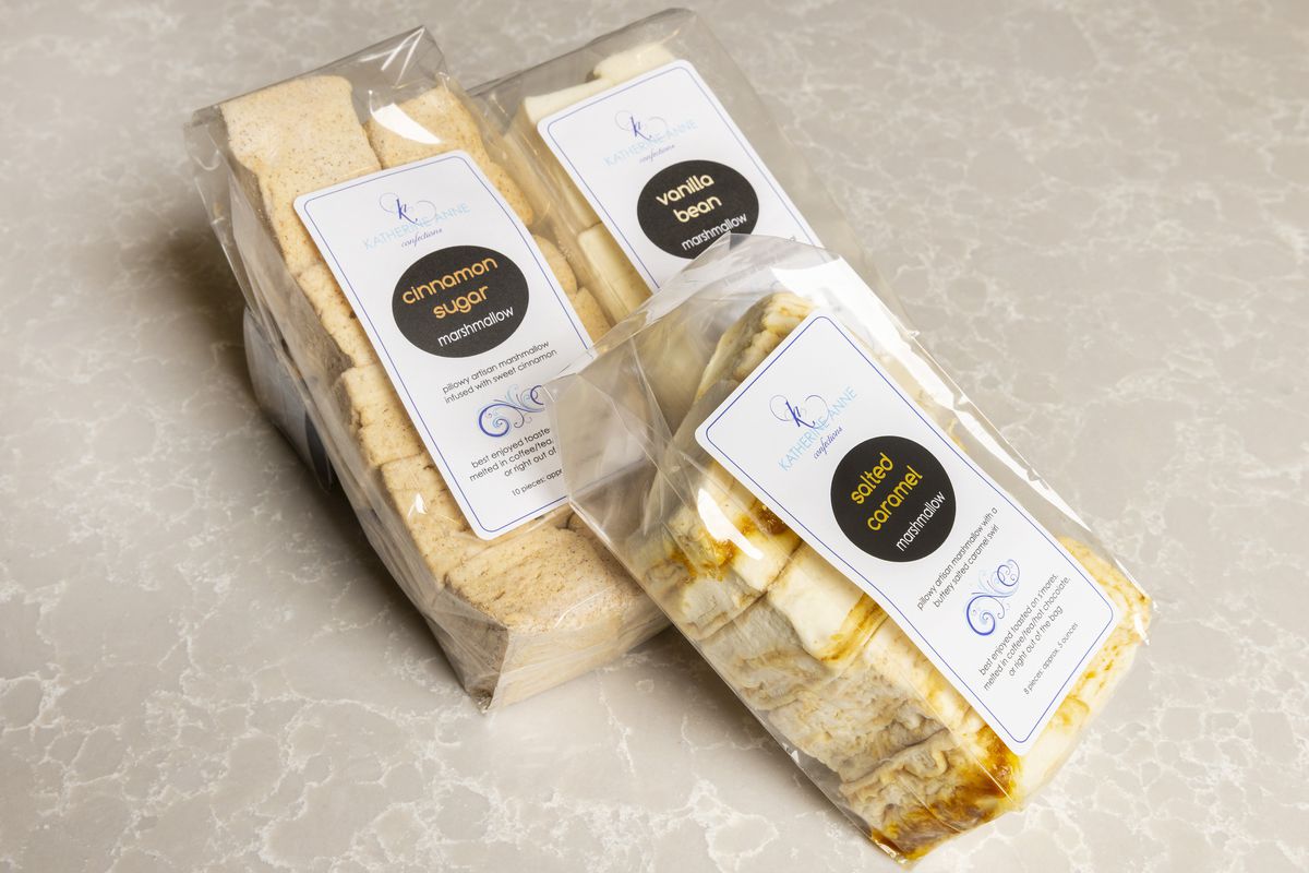 Three packages of gourmet marshmallows.