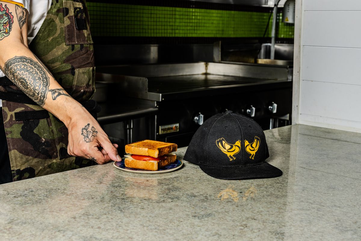 The Jeppson’s Malort grilled cheese with a familiar baseball cap.