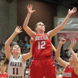 Brooke Henrie goes up for a rebound in Delta's 55-34 quarterfinal win over North Summit Thursday night. 