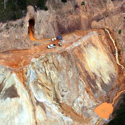 Wastewater streams out of the Gold King Mine near Silverton, Colorado, on Tuesday Aug. 8. 2015. Millions of gallons of contaminated water from the mine poured into the Animas and San Juan rivers after a worker on with an EPA cleanup crew caused a breach at the mine on Aug. 5,