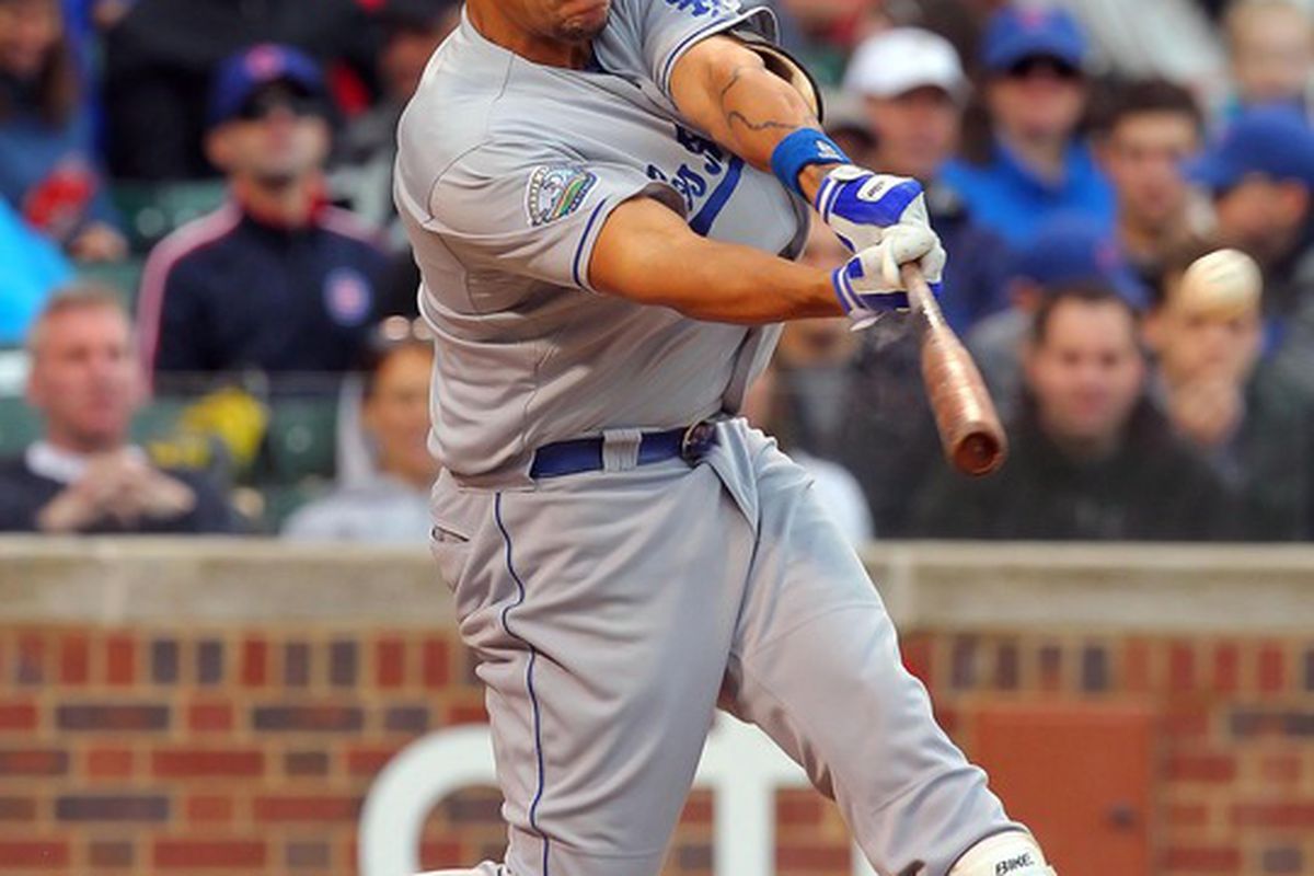 Chicago, IL, USA; Los Angeles Dodgers left fielder Juan Rivera hits a 2 run home run against the Chicago Cubs at Wrigley Field. Credit: Dennis Wierzbicki-US PRESSWIRE