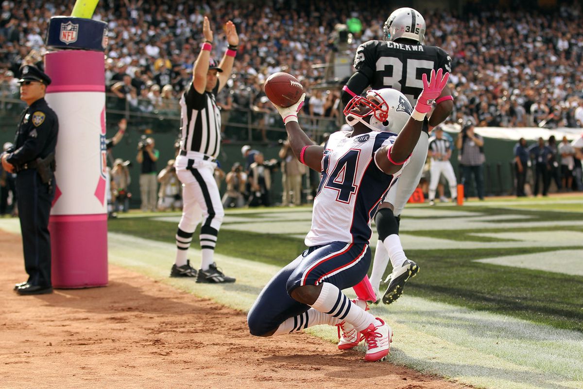 OAKLAND, CA - OCTOBER 02:   Deion Branch #84 of the New England Patriots celebrates after scoring a touchdown against the Oakland Raiders at O.co Coliseum on October 2, 2011 in Oakland, California.  (Photo by Ezra Shaw/Getty Images)