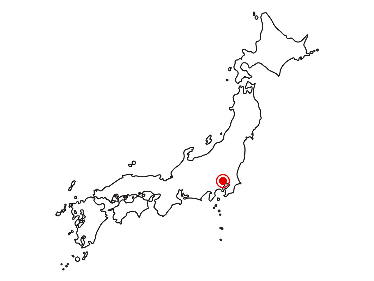 A map of Japan with a red dot indicating Tokyo.