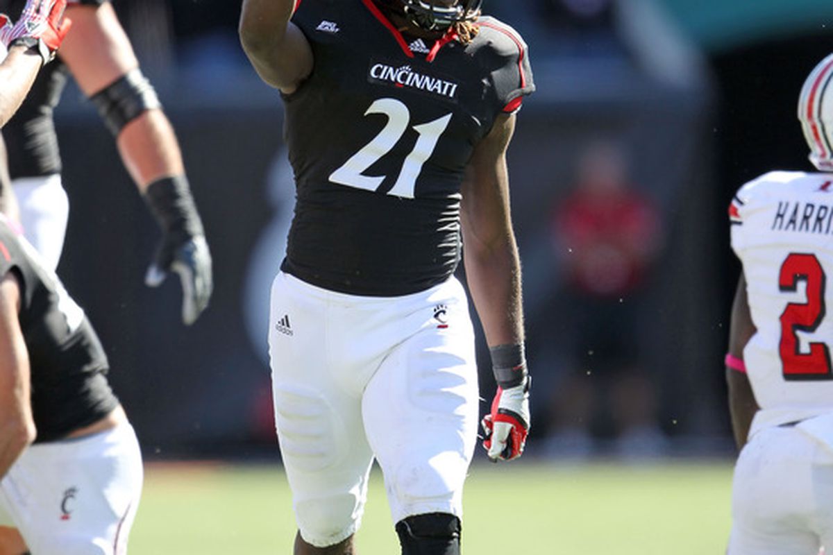 CINCINNATI, OH - OCTOBER 15:  Camerron Cheatham #21 of the Cincinnati Bearcats celebrates during the game against the Louisville Cardinals at Paul Brown Stadium on October 15, 2011 in Cincinnati, Ohio.  (Photo by Andy Lyons/Getty Images)