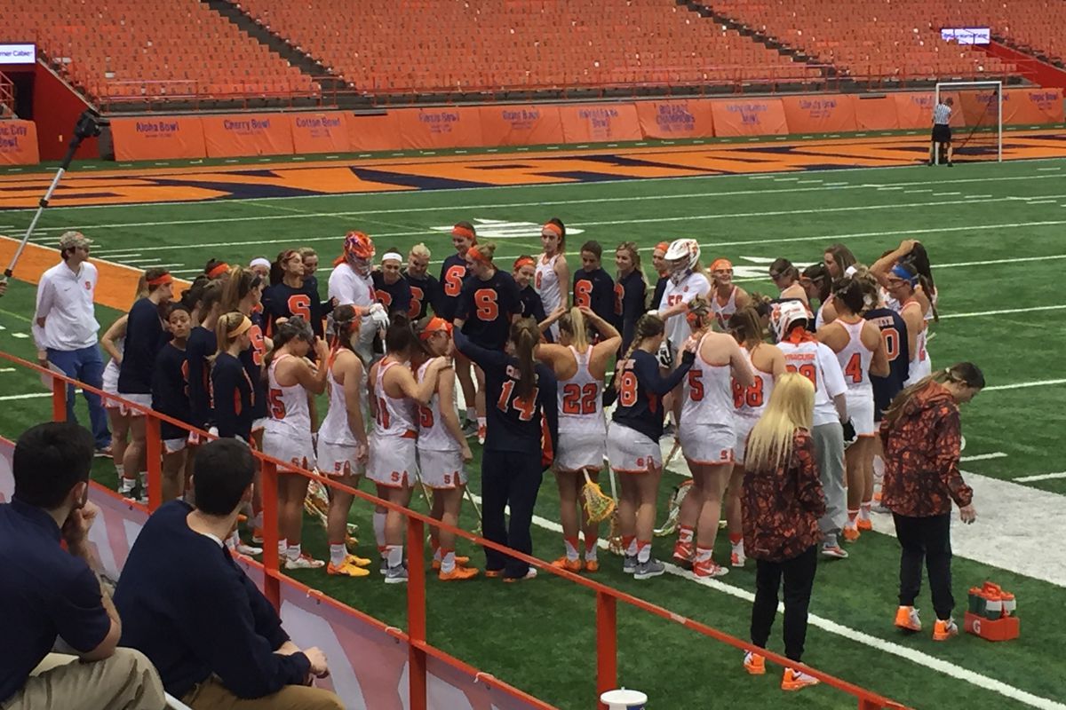 The Syracuse women's lacrosse team circles up before their game against Marist at the Carrier Dome. February 21, 2016.