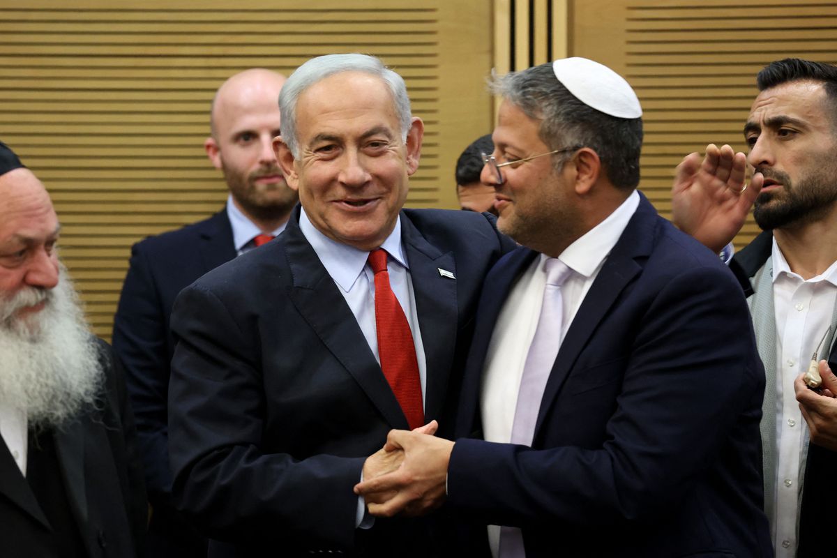 Netanyahu embraces and shakes hands with Ben-Gvir.