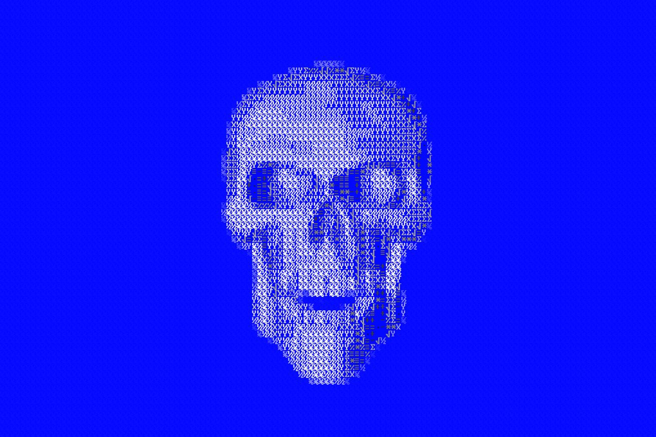 A laughing skull made out of code.