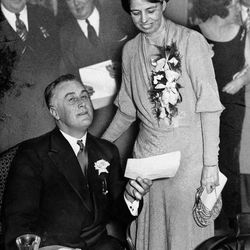 Gov. Franklin D. Roosevelt of New York holds one of many congratulatory telegrams received on his victory in the presidential election, Nov. 8, 1932, at the Hotel Biltmore in New York City. His wife Eleanor smiles as she reads over his shoulder.