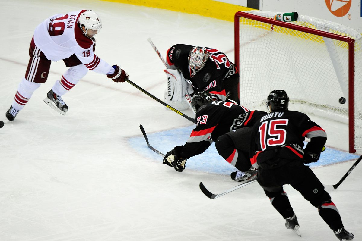 Shane Doan scores in the third period against the Canes