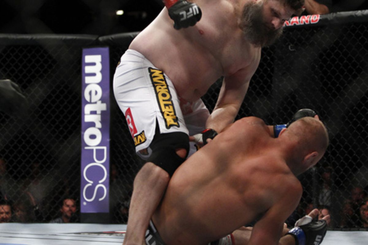 Roy Nelson follows up on a hurt Dave Herman at UFC 146 in Las Vegas, Nevada on May 26, 2012. Photo by Esther Lin via MMAFighting.com. 