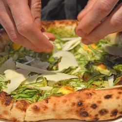 <strong>Cheese</strong>: No pizza is complete without cheese and diners won't be disappointed this time, either. Thick curls of white pecorino from the <a href="https://www.houstondairymaids.com/">Houston Dairymaids</a> is hand-shaved and layered lavishly