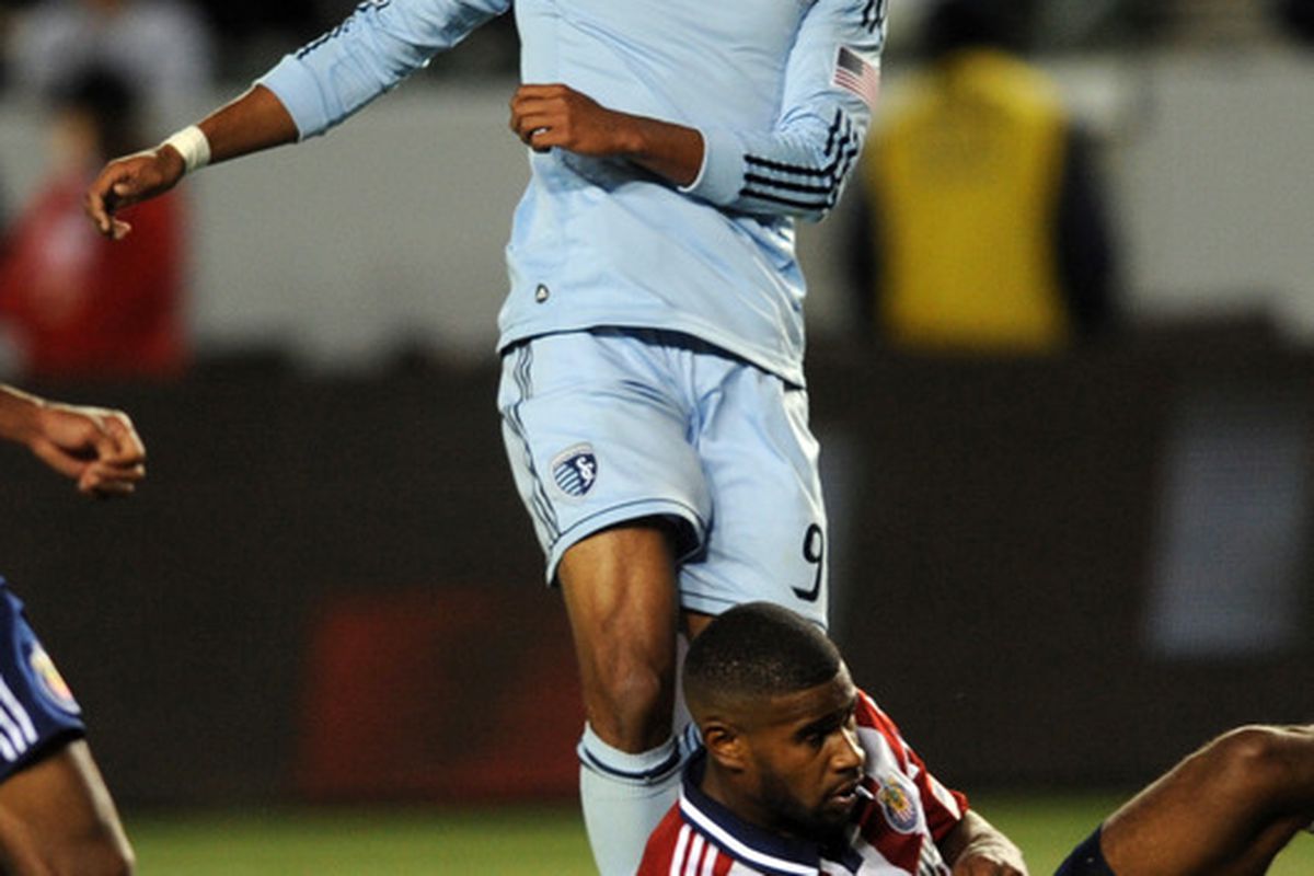 Apr 1, 2012; Carson, CA, USA; Sporting KC forward Teal Bunbury (9) reacts after a shot against the Chivas USA during the second half at the Home Depot Center. Sporting KC defeated Chivas USA 1-0. Mandatory Credit: Kelvin Kuo-US PRESSWIRE