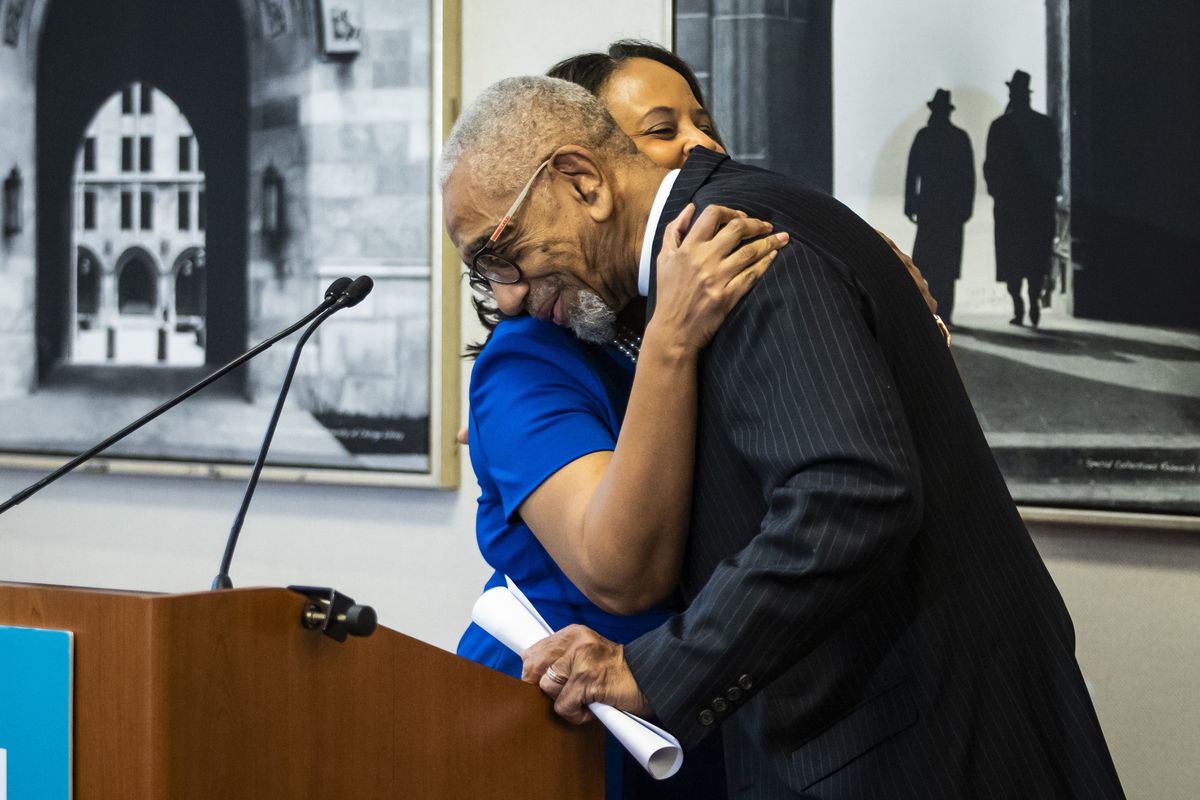 U.S. Rep. Bobby Rush, D-Ill., retiring from Congress next year after 15 terms, hugs Karin Norington-Reaves after endorsing her in the race to succeed him on Thursday.
