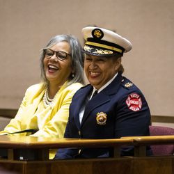 Seated next to U.S. Rep. Robin Kelly, Annette Nance-Holt is appointed as the first Black woman to serve as commissioner of the Chicago Fire Department during the Chicago City Council meeting at City Hall, Wednesday morning, June 23, 2021.