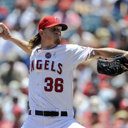 Los Angeles Angels starting pitcher Jered Weaver throws to the New York Yankees during the first inning of a baseball game in Anaheim, Calif., Sunday, June 16, 2013. 