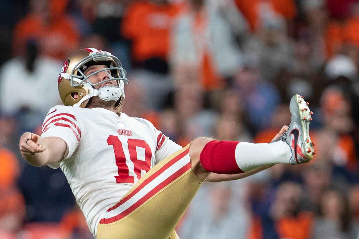 Mitch Wishnowsky #18 of the San Francisco 49ers punts during the game against the Denver Broncos at Empower Field At Mile High on September 25, 2022 in Denver, Colorado.