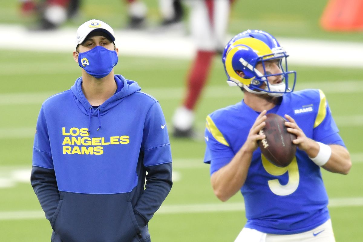 Jared Goff #16 looks on as John Wolford #9 of the Los Angeles Rams warms up before the game against the Arizona Cardinals at SoFi Stadium on January 03, 2021 in Inglewood, California.