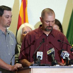 Rick Ivie and his brother Chris talk to the media about Border Patrol agent Nicholas Ivie at Cochise College in Sierra Vista, Ariz., Thursday, Oct. 4, 2012.  Ivie was killed while on a regular patrol near the Arizona/Mexico border.