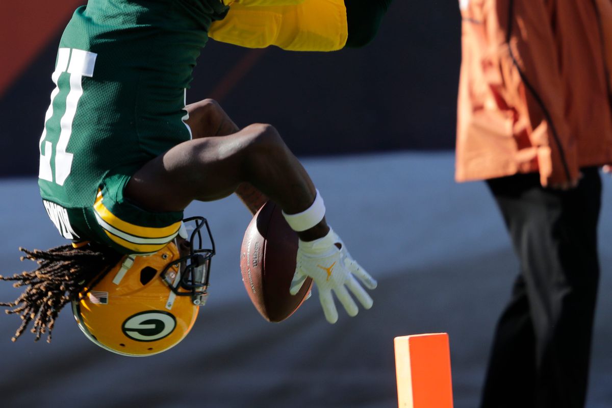 Green Bay Packers wide receiver Davante Adams (17) dives into the end zone after a long first down reception in the fourth quarter against the Chicago Bears during their football game Sunday, October 17, 2021, at Soldier Field in Chicago, Ill. Adams stepped out of bounds before reaching the end zone. Green Bay won 24-14.