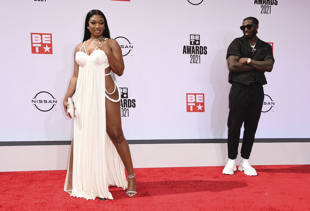 Megan Thee Stallion, left, and Pardison Fontaine arrive at the BET Awards on Sunday, June 27, 2021, at the Microsoft Theater in Los Angeles.