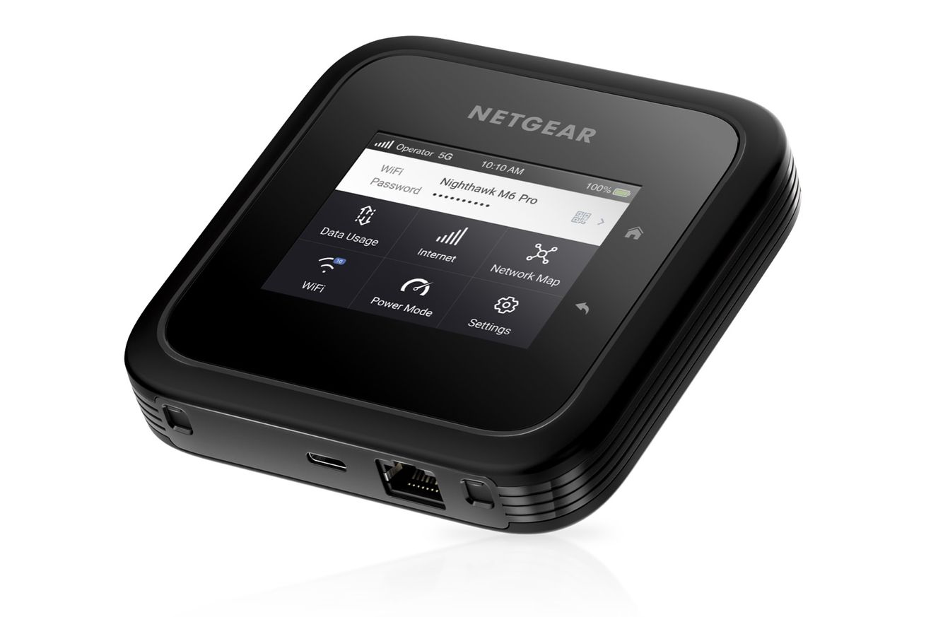 netgear mobile router M6 pro is a square puck with a 2.8-inch touch screen, ethernet jack, and USB-C port.