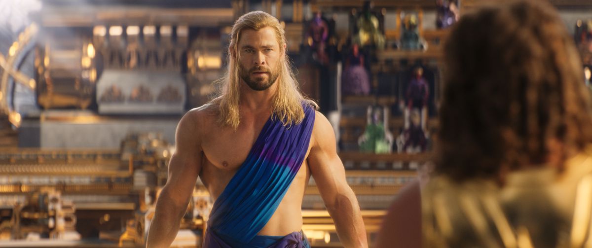 Chris Hemsworth as a mildly confused-looking Thor in a toga in Thor: Love and Thunder