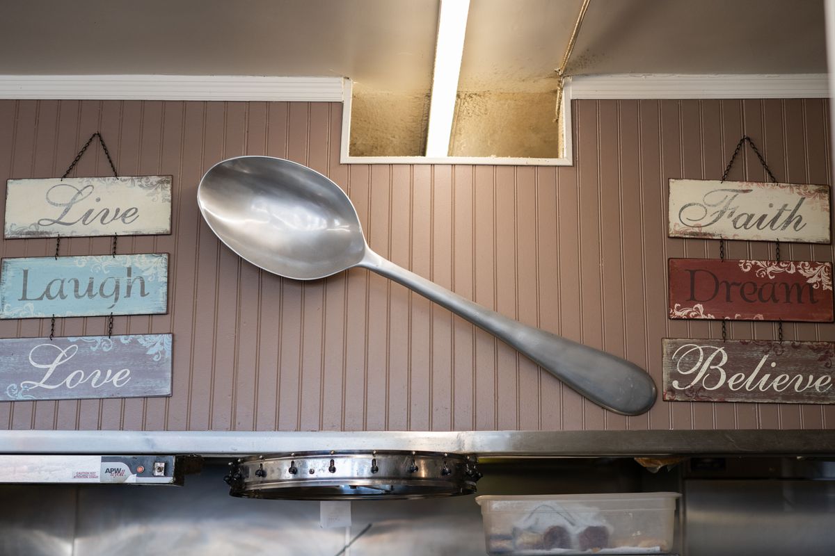 The Serving Spoon’s massive spoon just above the expediter station