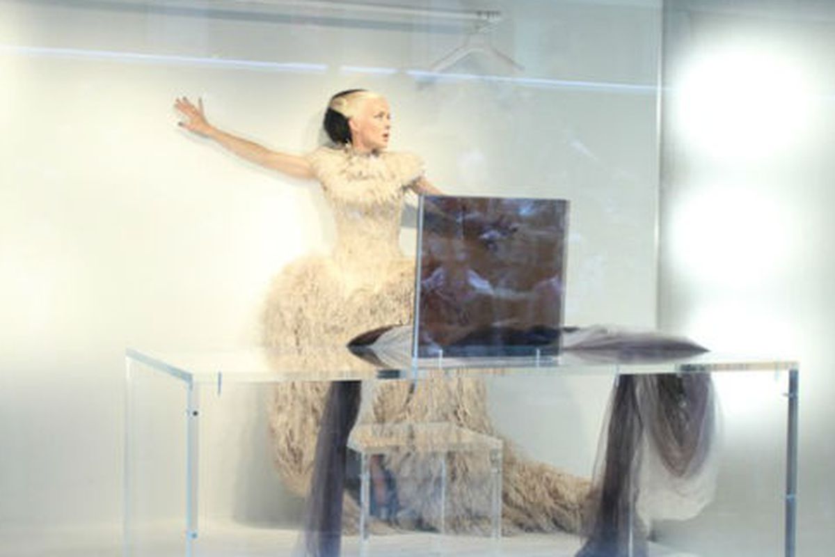 Daphne Guinness dressing for the 2011 Met Gala in the windows of Barneys, via WWD