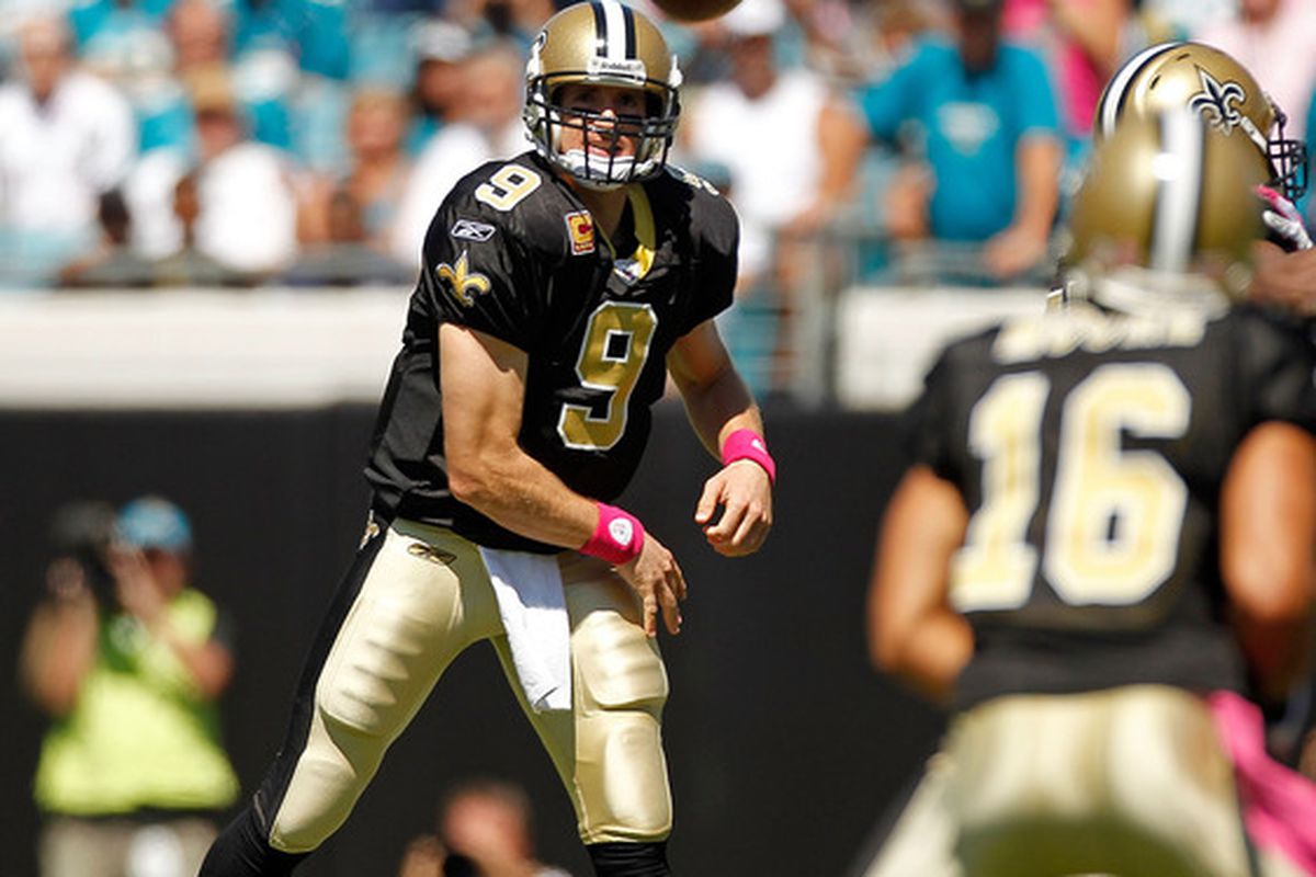 JACKSONVILLE, FL - OCTOBER 02:  Drew Brees #9 of the New Orleans Saints passes during a game against the Jacksonville Jaguars at EverBank Field on October 2, 2011 in Jacksonville, Florida.  (Photo by Mike Ehrmann/Getty Images)