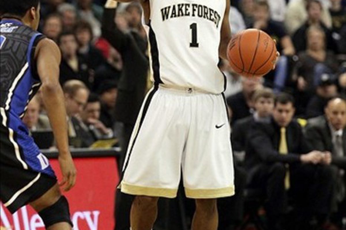 Feb 28, 2012; Winston-Salem, NC, USA; Wake Forest Demon Deacons guard Tony Chennault (1) calls out a play during the first half against the Duke Blue Devils at Lawrence Joel Veterans Memorial Coliseum. Mandatory Credit: Jeremy Brevard-US PRESSWIRE